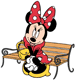 Minnie sitting on a bench