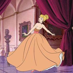 Cinderella wearing a gold ballgown in the castle
