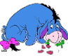 Eeyore holding a drooping flower