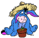 Eeyore watching over a potted plant