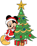 Mickey Mouse leaning against his Christmas tree