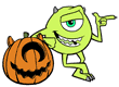 Mike Wazowski leaning against a monster pumpkin from Monsters, inc.