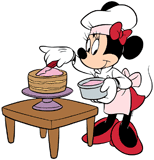 Minnie Mouse frosting a cake