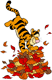 Tigger jumping into a pile of fall leaves