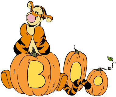 Tigger leaning on carved pumpkins