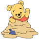 Baby Pooh playing in sand