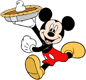 Mickey Mouse holding a Thanksgiving pie