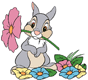 Thumper holding a flower in his mouth