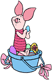 Piglet sitting in an Easter basket