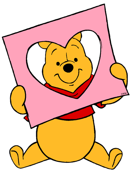 Winnie the Pooh holding up a Valentine's Day heart-shaped cut-out card